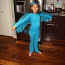 Mi nombre es Kayla, tengo 8 años y este disfraz lo hice con mis abuelos.  Primero corté el ala de la gorra de béisbol de mi hermano (todavía está