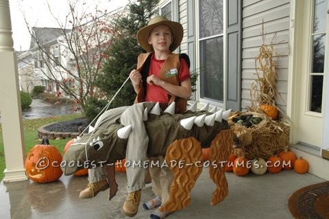 Increíble disfraz de entrenador de dinosaurios ilusión para niño