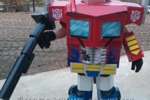 Traje de Optimus Prime con cicatrices de batalla para niño