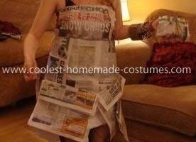 El traje de periódico más genial.